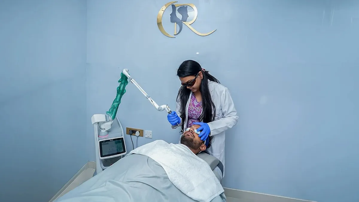Dermatologist Dr. Anusha Meka performing a skin rejuvenation treatment using the Fotona StarWalker laser