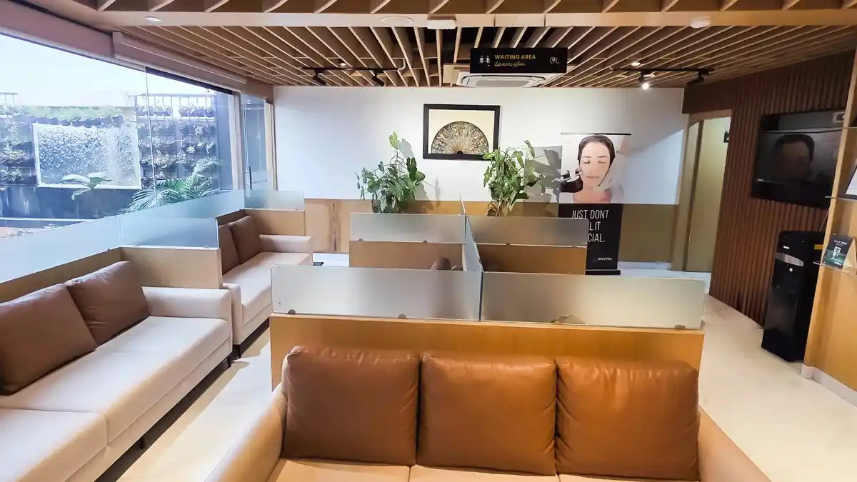 Row of private patient waiting booths with frosted glass shields for confidentiality